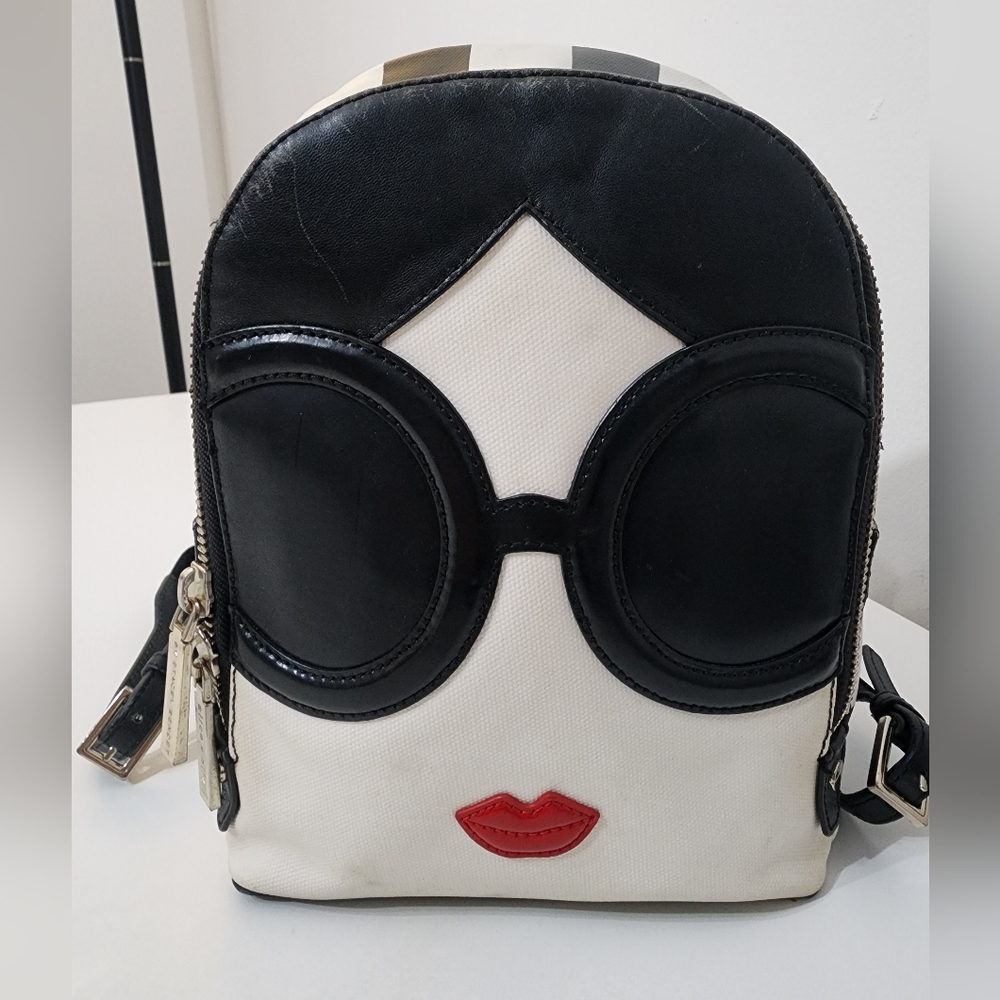 Chic Black and White Backpack with Red Accent